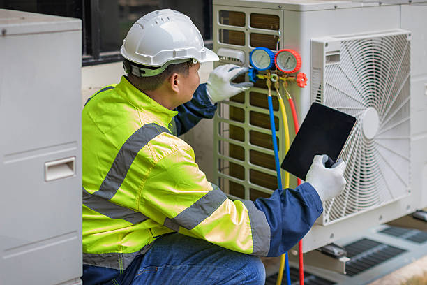 Professional Air Duct Cleaning technician working in Flowood, MS